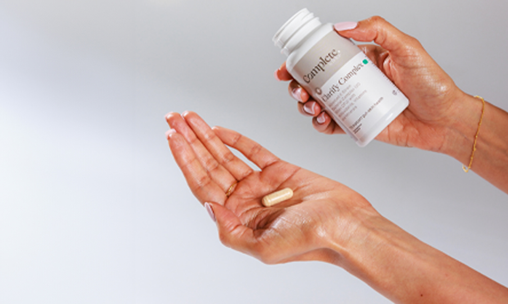 capsule clarify Clarify capsule held in an open palm